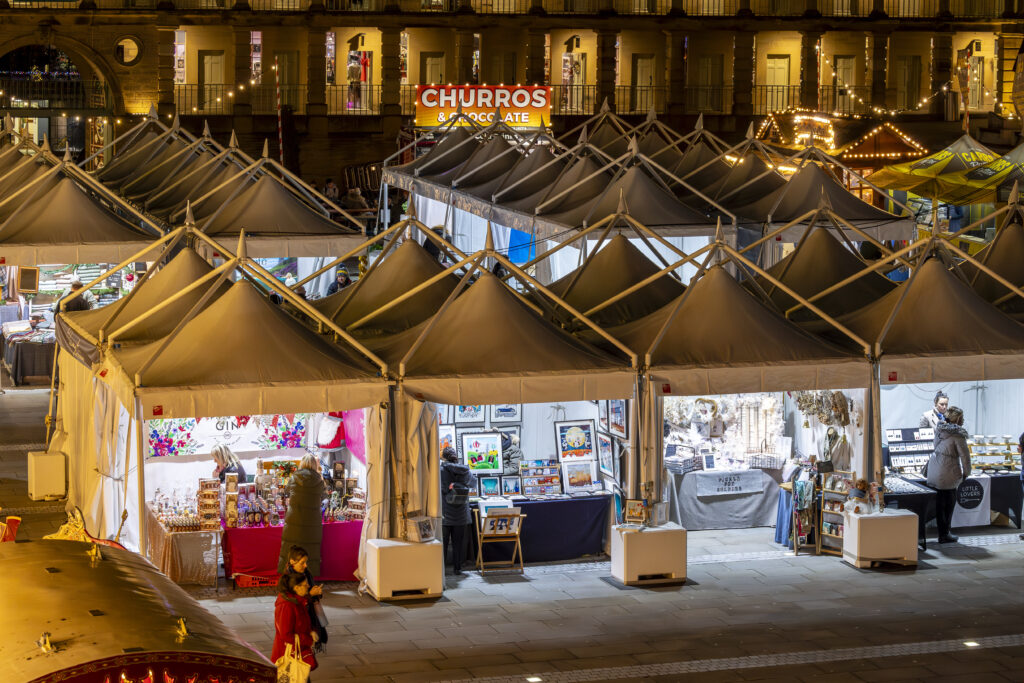 Piazza pagodas used for retail units at The Piece Hall Christmas market, Halifax. Supplied and installed by GL events UK