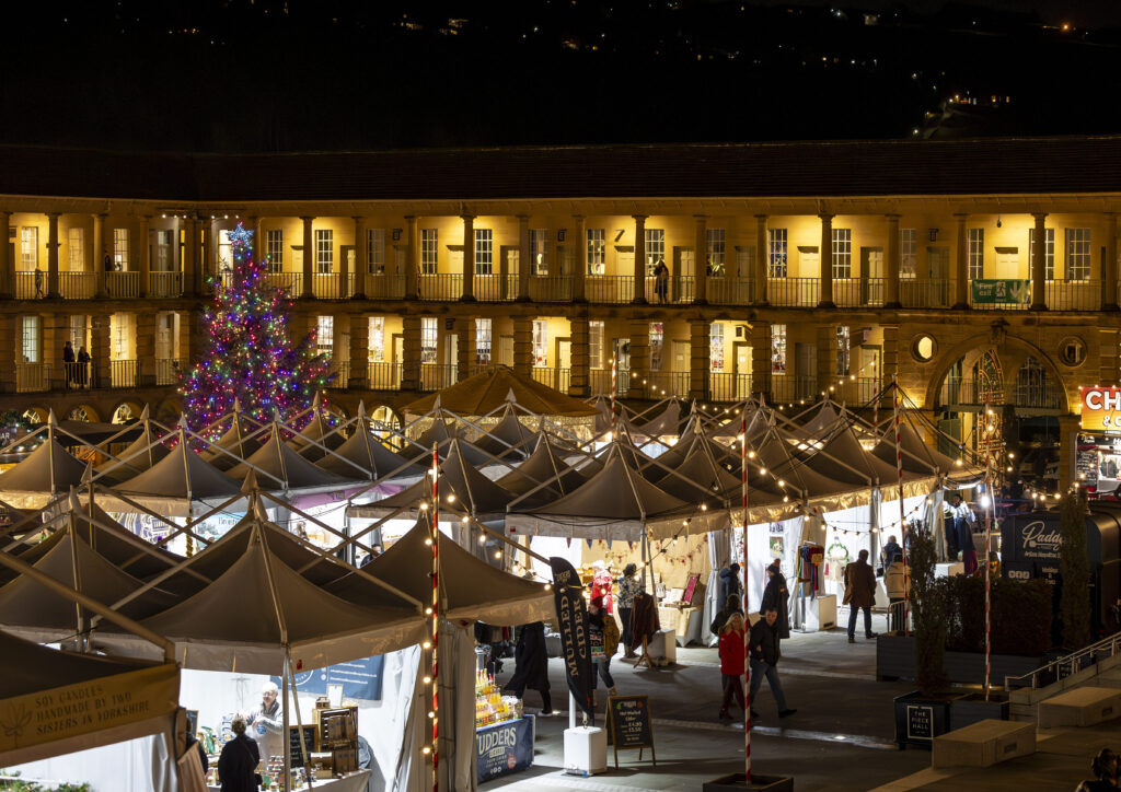 Piazza pagodas used for retail units at The Piece Hall Christmas market, Halifax. Supplied and installed by GL events UK