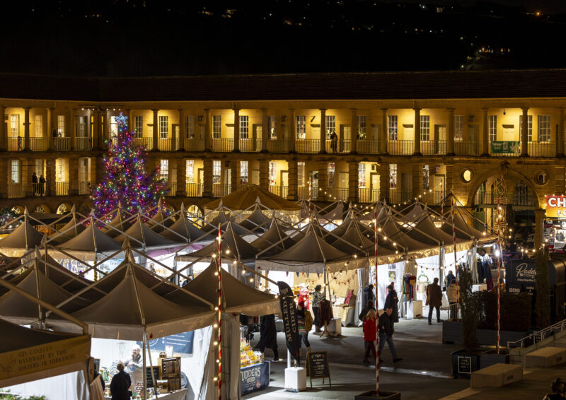 Piazza pagodas used for retail units at The Piece Hall Christmas market, Halifax. Supplied and installed by GL events UK