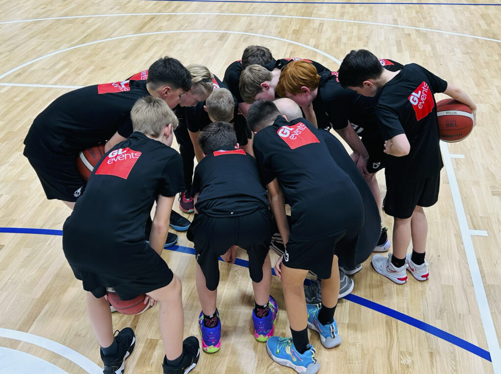 Players for Manchester Giants Juniors under 12 basketball team, sponsored by GL events UK