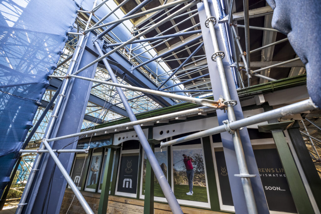Temporary grandstand built around and over the top of the St Andrews Links Trust Shop, for the The Open St Andrews 150th 2022. Designed and delivered by GL events UK.