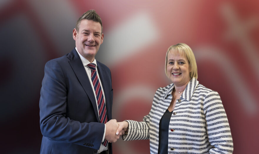 Scott Angela Handshake Banner